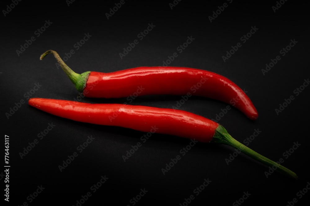red hot chili peppers, black background