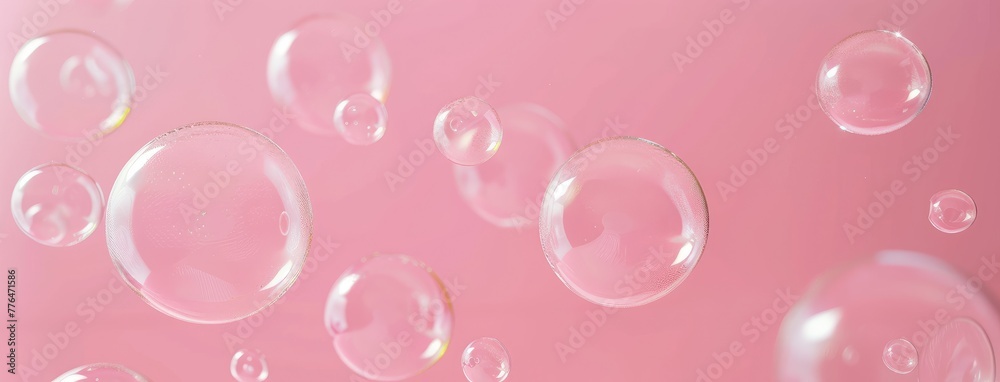 Transparent Soap Bubbles Floating on Pink Background