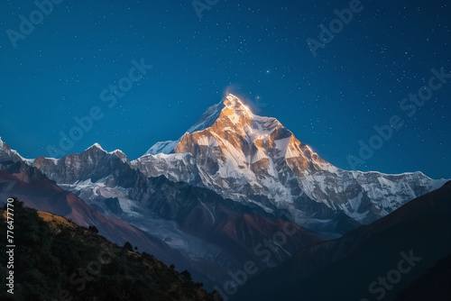 Majestic Mountain Peak Bathed in Ethereal Night Glow © Centric 