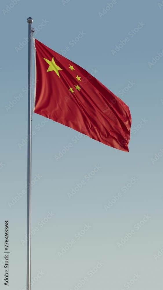 China PRC Beijing Flag vertical Cinematic Loop Realistic Motion Blue Sky