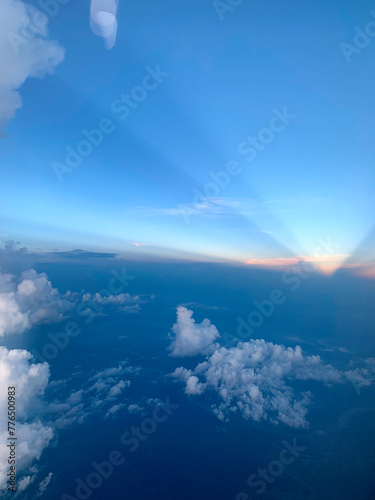 Sunset, sun rays and cloud formations over India.