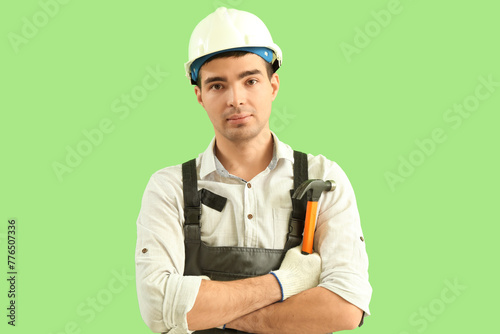 Young carpenter with file a...