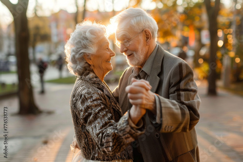 senior couple dancing outdoor on street.
