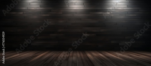 Dim lighting fills the room with a wooden floor and brick wall, creating a cozy and rustic atmosphere photo