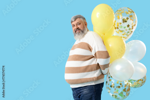 Senior man with bunch of ba...