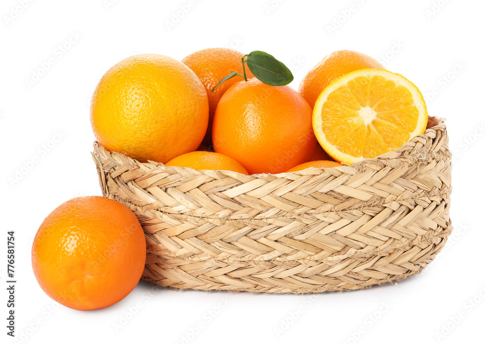 Fresh oranges in wicker basket isolated on white Fresh oranges in wicker basket isolated on white
