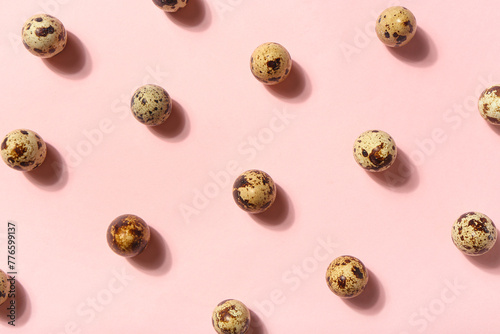 Many fresh quail eggs on pi...