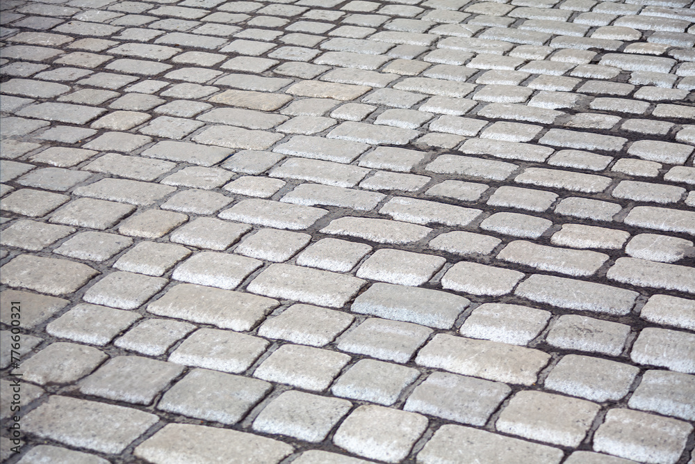 Cobblestone pavement texture. City walkway background Cobblestone pavement texture. City walkway background