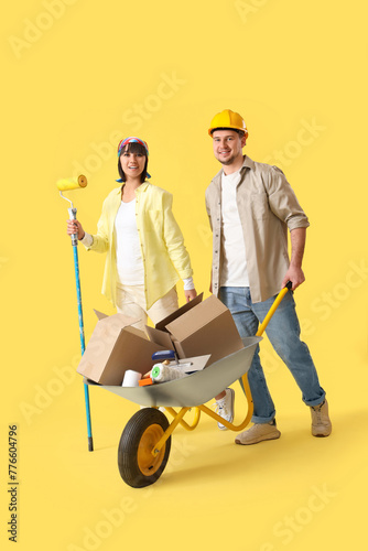 Young couple with tools and...