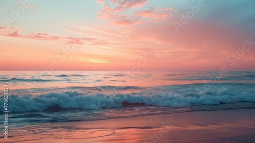 The serene beauty of a calm ocean at sunrise, where gentle waves whisper to the shore under a sky painted in soft hues of pink and orange. © Sasint