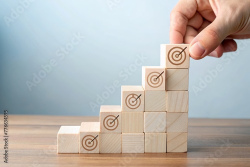 Business growth success achievement concept, hand arranging wooden block stacking as step stair or ladder for planning development leadership and customer target