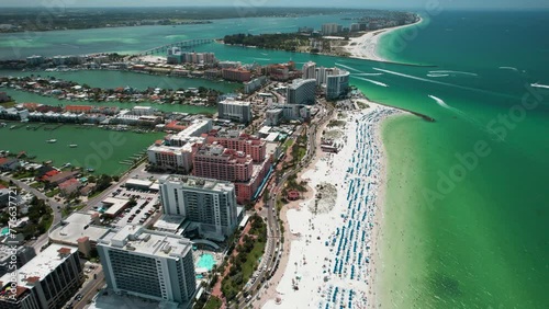 Clearwater Beach Florida. Florida beaches. Panorama of city. Spring or summer vacations. Beautiful view on Hotels and Resorts on Island. Blue color of Ocean water. American Coast. Gulf of Mexico shore photo
