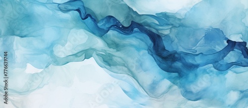 Vibrant blue and white abstract patterns created by ink dispersing in water, forming a mesmerizing artistic composition