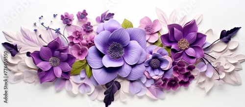 A simple arrangement of purple and white paper flowers displayed on a clean white surface