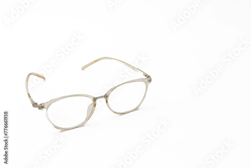 Elegant eyeglasses on white background