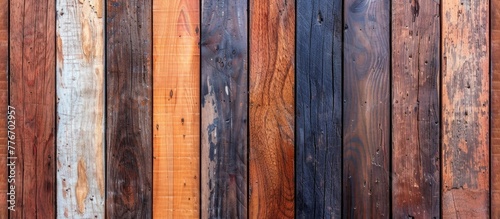 A close up of a wooden wall with multiple different colors