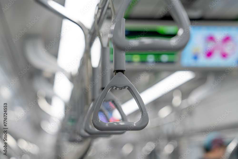 View of the grab bar inside the train