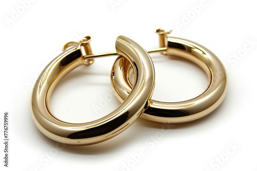 Timeless gold hoop earrings with a polished finish, Classic gold hoop earrings featuring a sleek and polished design.