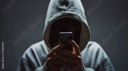 hacker or scammer using smartphone, phishing, online scam and cybercrime concept photo