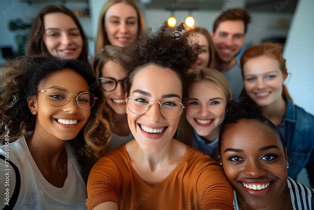 Obraz premium Multicultural happy people taking group selfie portrait in the office, diverse people celebrating together, Happy lifestyle and teamwork concept 