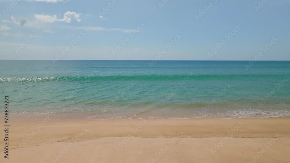Amazing sea beach with ocean wave foams.Beautiful nature beach sand sea surface,Waves crashing on sand,Wide angle lens