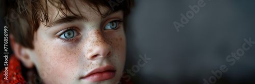 Portrait of young individual with Autism, candid expression