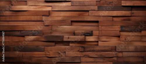 Close up view of a textured wooden wall featuring a single black knob for decor or functionality