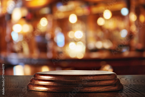 Εκτύπωση καμβά Empty Wooden Bar Counter with Warm Bokeh Lighting