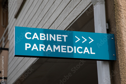 cabinet paramedical french text on facade means doctor paramedic office wall building sign