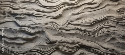 Close-up view of a massive wall featuring an intricate wave design, creating a stunning visual pattern