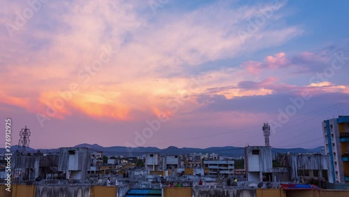 Timelapse of sunset over a city during rainy season. Shot in 4K ultra HD 60fps for the smoothest and the clearest video experience.