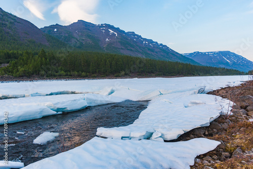 Snow and ice. Hoisey river. Polar day on Putorana Plateau, Taimyr, Russia