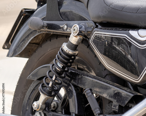 Motorcycle Rear Wheel on Shock Absorber and Spring - Suspension