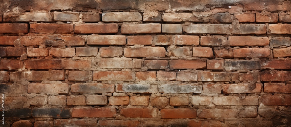Close-up view showing a weathered brick wall with a tiny window, adding a touch of character and charm to the architecture Close-up view showing a weathered brick wall with a tiny window, adding a touch of character and charm to the architecture
