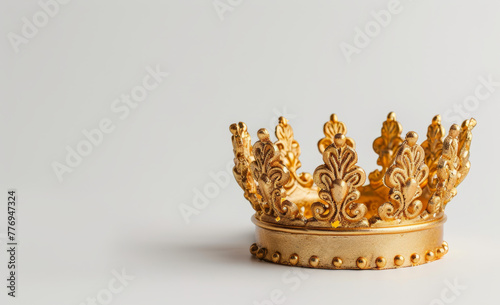 Majestic Gold Crown Displayed on White Background, Perfect for Product Photography