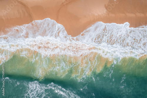 Nature's Brushstrokes: Waves Against the Rocky Shore