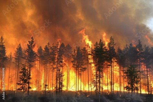 Massive forest fire with dark smoke and flames