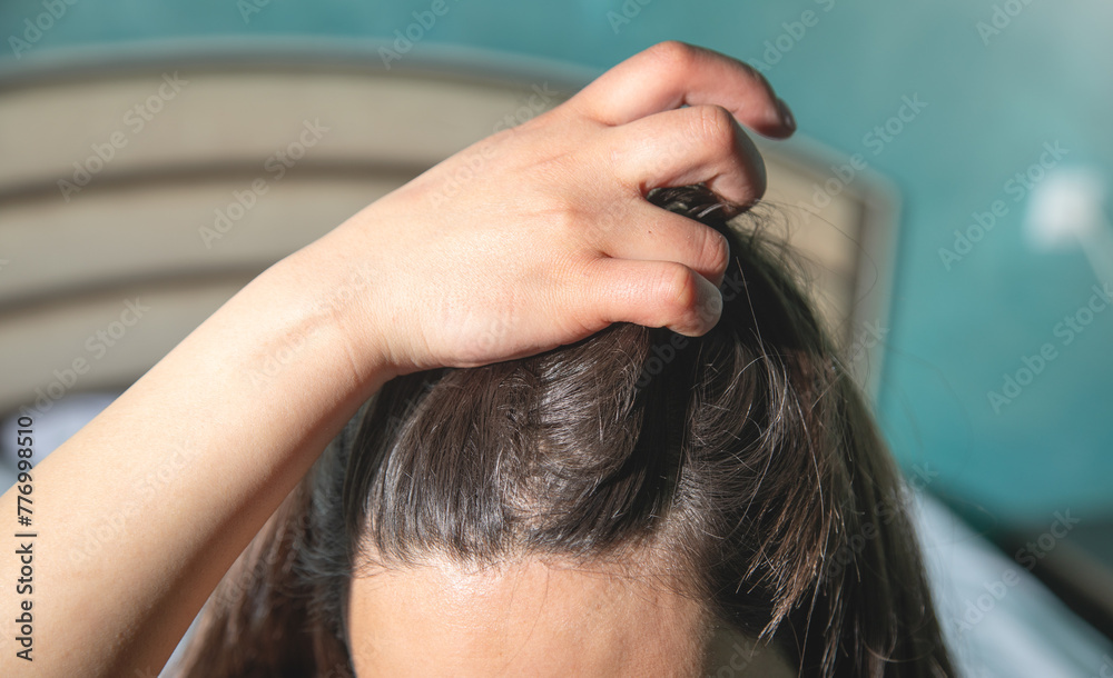 Fototapeta premium Caucasian woman showing her hair.