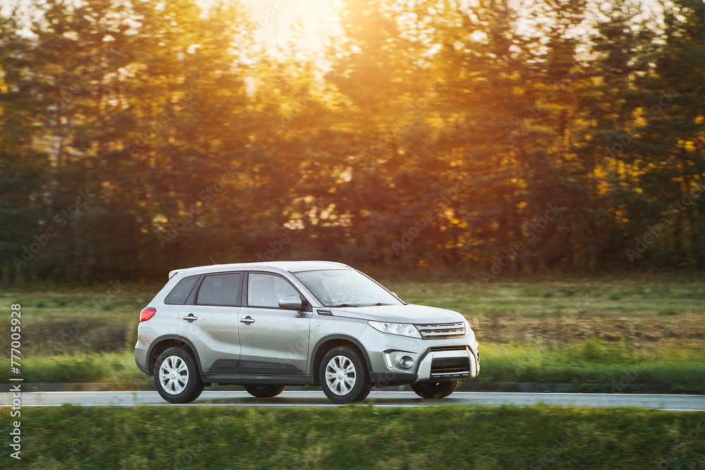 Sport utility vehicle on the road. A luxury car for sport and travel. SUV is the new most wanted type of car amongst all markets. Sport utility vehicle on the road. A luxury car for sport and travel. SUV is the new most wanted type of car amongst all markets.