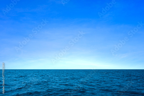Ocean sea background and the clear sky For summer vacation ideas Nature of summer sea water with sunlight The sea sparkles against the blue sky.
