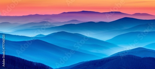 Majestic sunrise landscape with mountain shrouded in fog under a vibrant orange morning sky