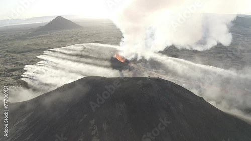 Aerial video of a volcanic eruption, lava and rivers, Litli Harut, Iceland photo
