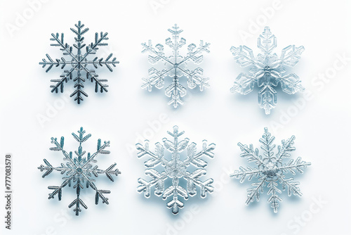 Set of different snowflakes isolated on white background. Macro photo of real snow crystals.