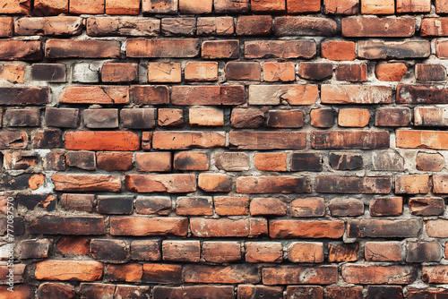 Old red brick wall background, wide panorama of masonry. Red brick laid in rows horizontally.