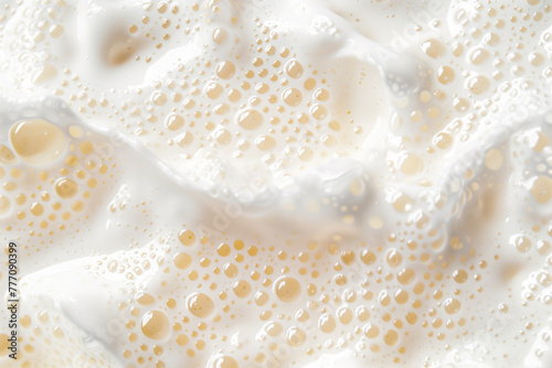 Close up of soapy foam texture as a background. Macro shot of bubbles with shimmering effect on the surface photo
