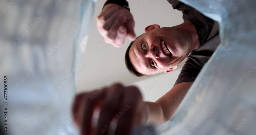 Happy man finding dollars in trash can bottom view 4k movie slow motion. Good luck and pleasant finds concept Happy man finding dollars in trash can bottom view 4k movie slow motion. Good luck and pleasant finds concept