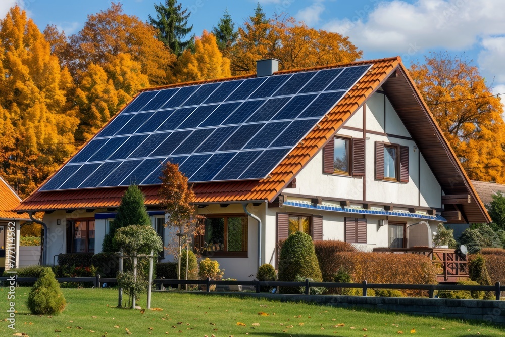 A house featuring a rooftop solar panel for renewable energy generation