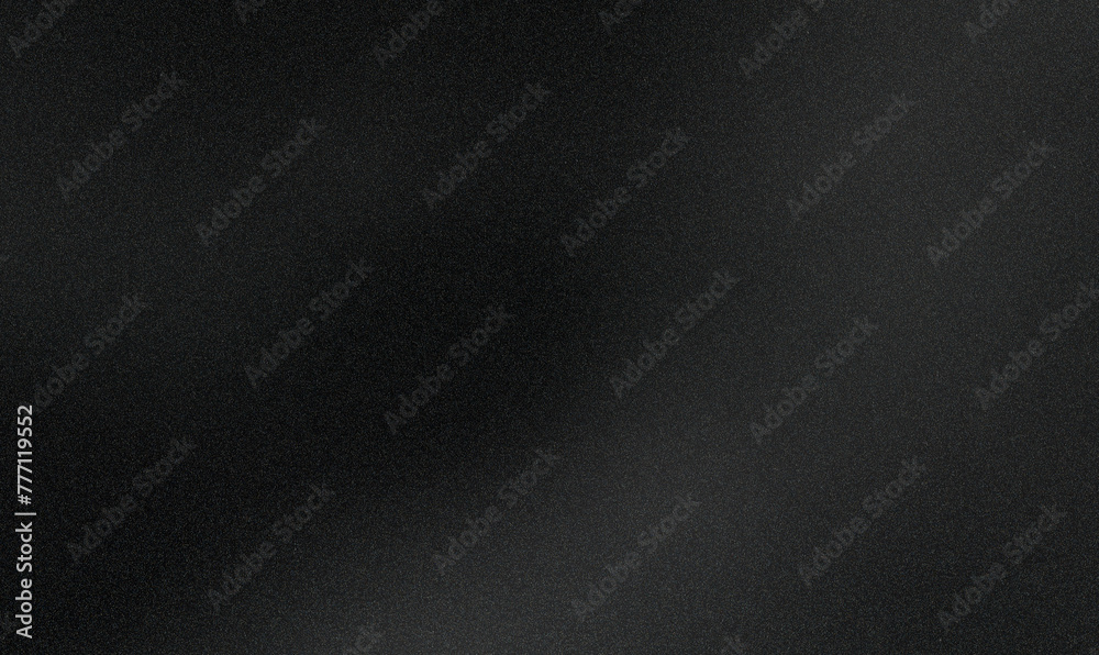 White grayish graphite gradient on a coal black grainy background White grayish graphite gradient on a coal black grainy background