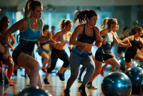 Vibrant Indoor Cycling Class with Enthusiastic Women
