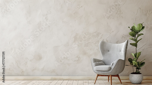 Contemporary minimal interior armchair on blank grey wall